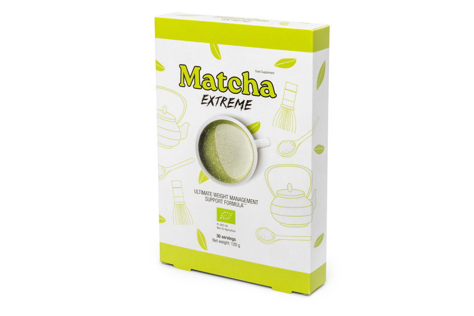 Tin of organic matcha powder with bamboo whisk